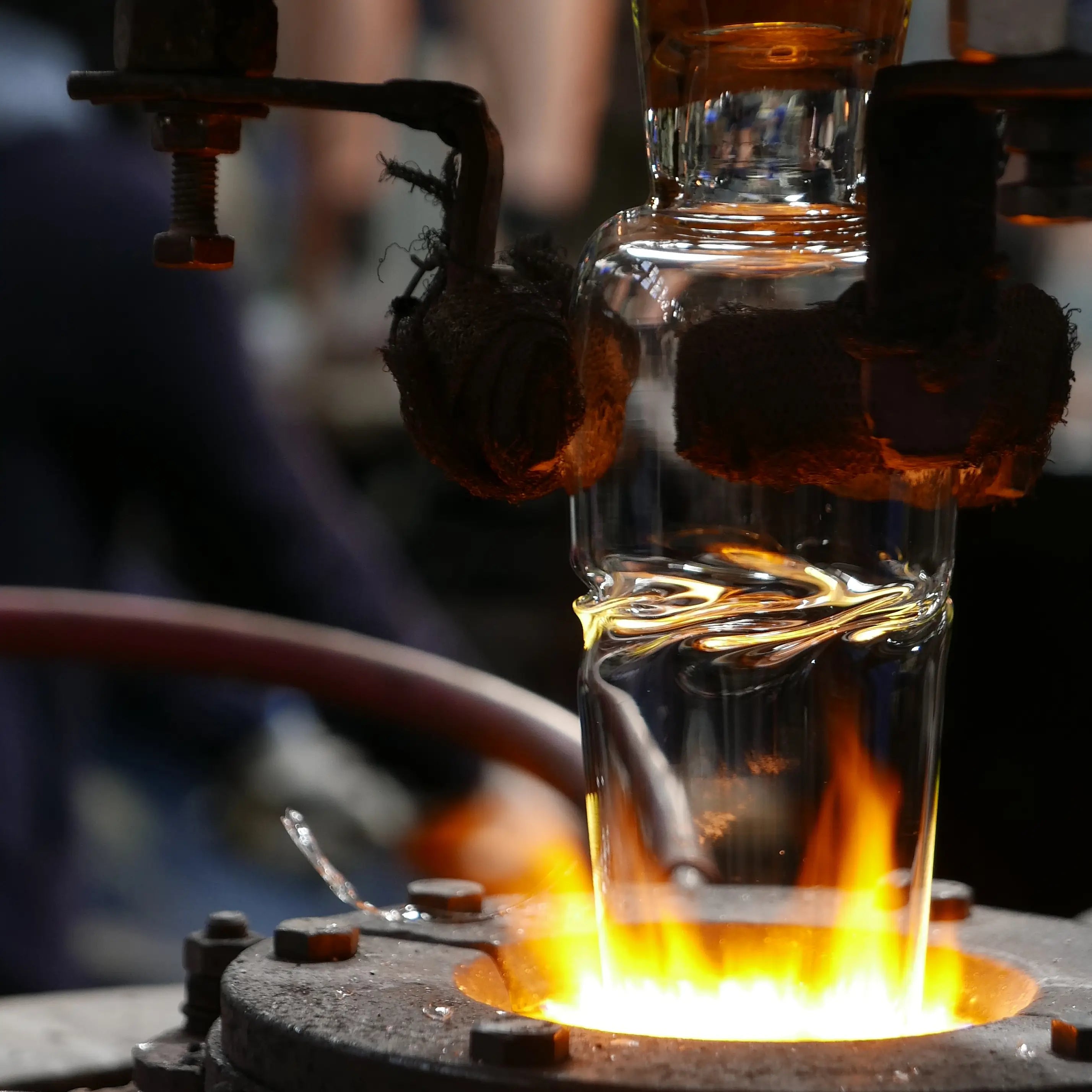 Glass apparatus over a flame with liquid being heated